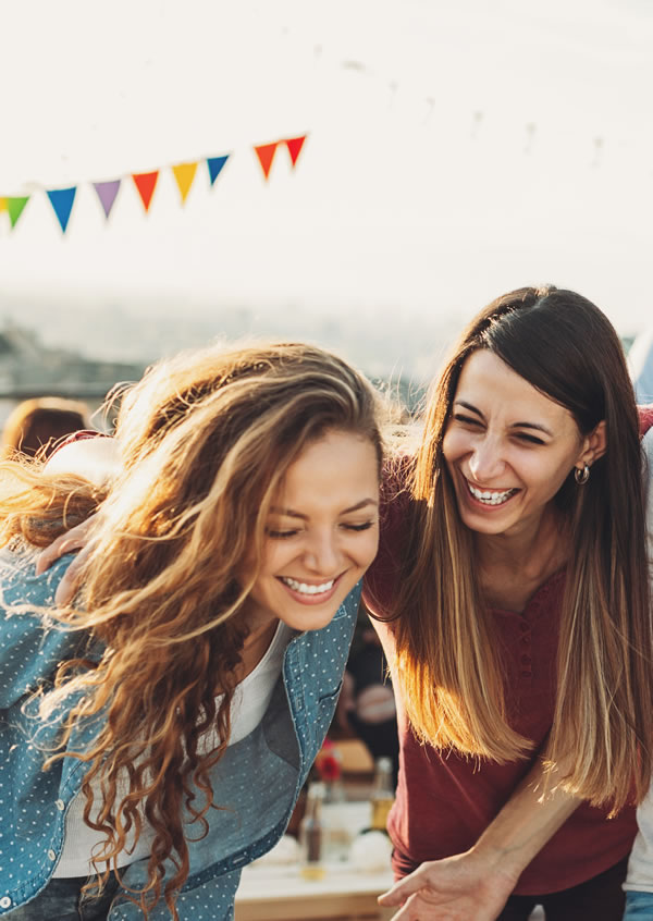 Friends socialising at party